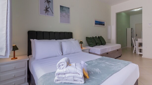 A hotel room with a bed, a nightstand, a desk, and a chair. - 6 Minutes From Copacabana Beach Nsc904b (Rio de Janeiro)