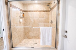 Shower, hair dryer, towels, soap