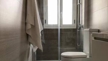 Apartment, Beach View | Bathroom | Shower, hair dryer, towels, soap