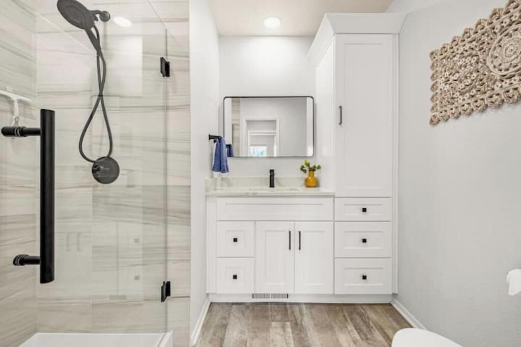 Shower, hair dryer, towels, soap