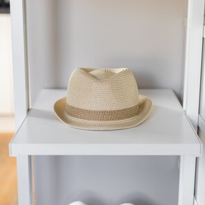 A straw hat on a white shelf. - Bright Covent Garden Studio - Netflix Nespresso (London)