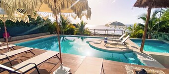 Santorini House with ocean access in Cozumel