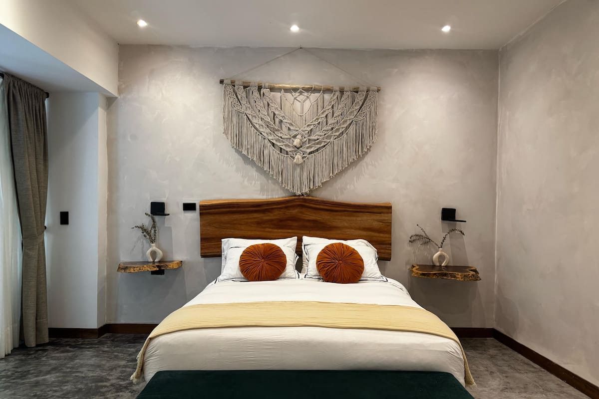 Deluxe Double Room, Garden View | Desk, laptop workspace, blackout drapes, iron/ironing board