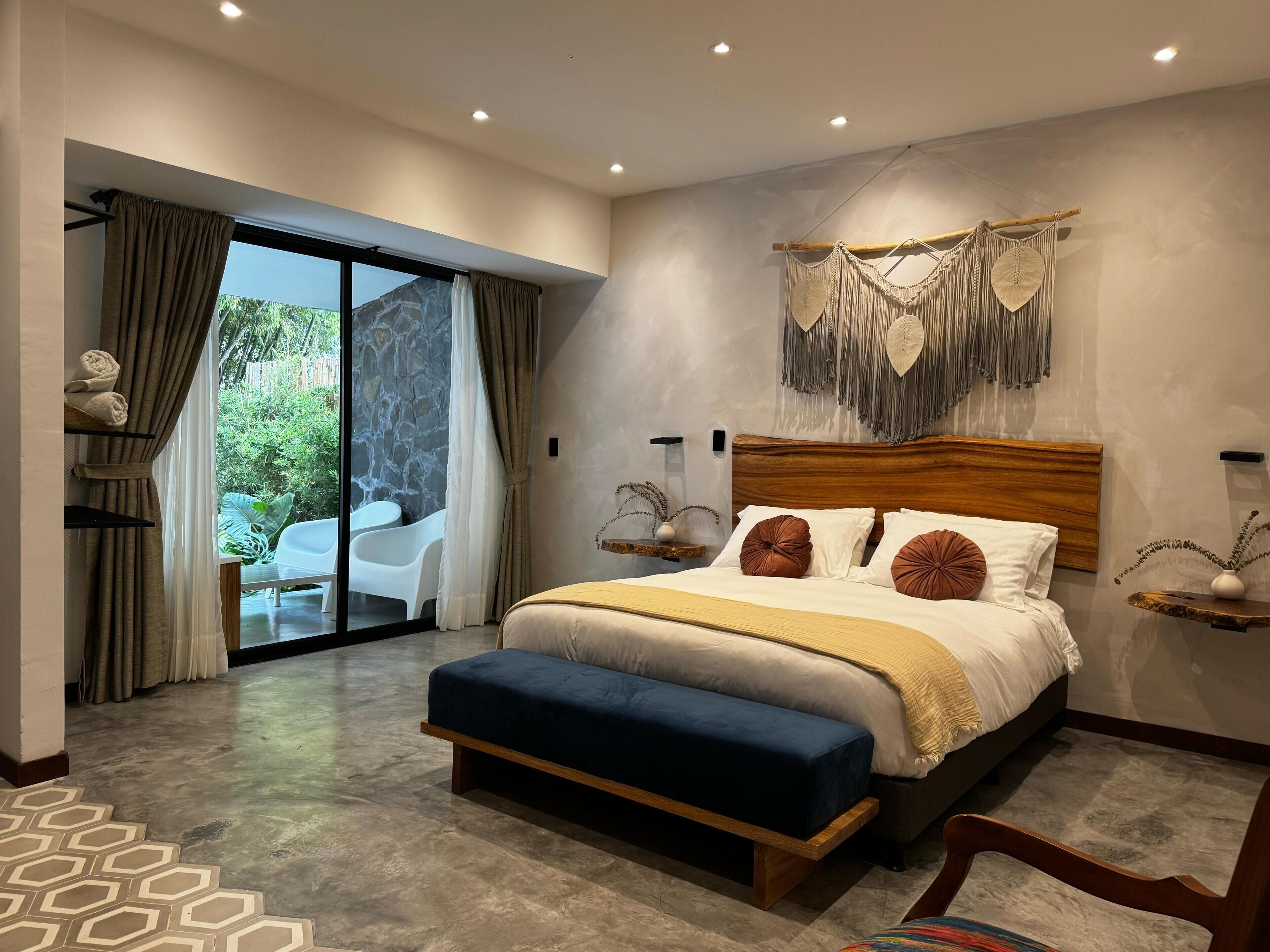 Deluxe Double Room, Garden View | Desk, laptop workspace, blackout drapes, iron/ironing board