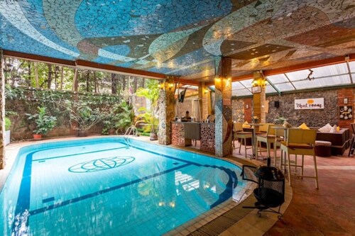 ALBA 1BR Retreat with Pool & Gym near Yaya Center.