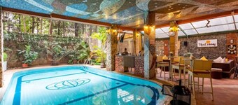 ALBA 1BR Retreat with Pool & Gym near Yaya Center.