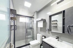 Shower, hair dryer, towels, soap