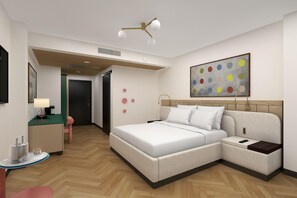 A modern hotel room with a large bed, a desk, a chair, a small table, and a TV. - Hilton Miami Beach (Miami Beach)