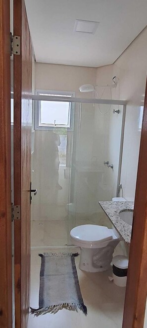 Apartment, 2 Bedrooms, Patio | Bathroom | Shower, soap, toilet paper - Pousada Village Maitinga (Bertioga)