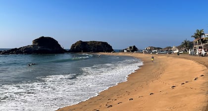 Charming 1-bedroom apartment garden and ocean view San Agustinillo with AC