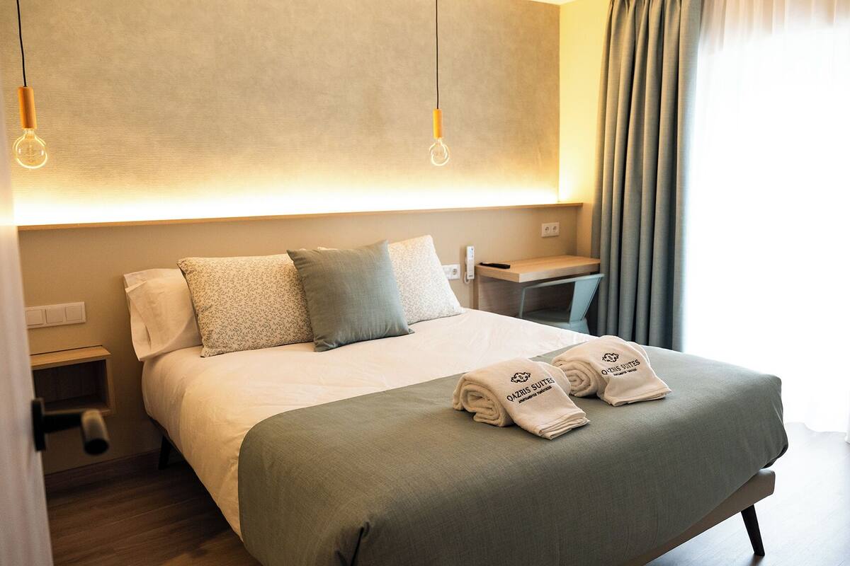 Apartment, 1 Bedroom, Balcony, City View | Premium bedding, down comforters, memory foam beds, desk
