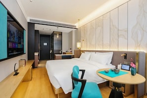 Habitación individual Confort, vista a la ciudad | Área de sala de estar
