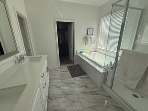 Bidet, towels, soap, toilet paper