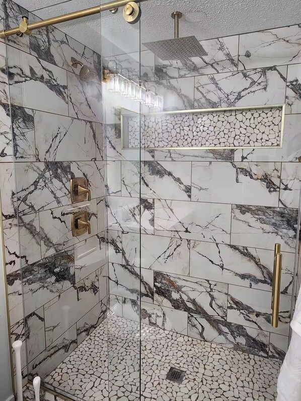 Shower, hair dryer, towels, soap