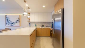 Apartment | Private kitchen | Coffee/tea maker, dining tables