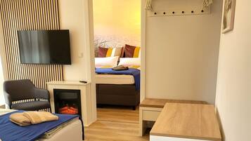 1 dormitori, planxa i posts de planxar, wifi gratuïta i roba de llit