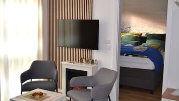 1 habitación, tabla de planchar con plancha, wifi gratis y ropa de cama