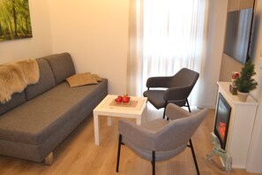 Een smart-tv en een open haard