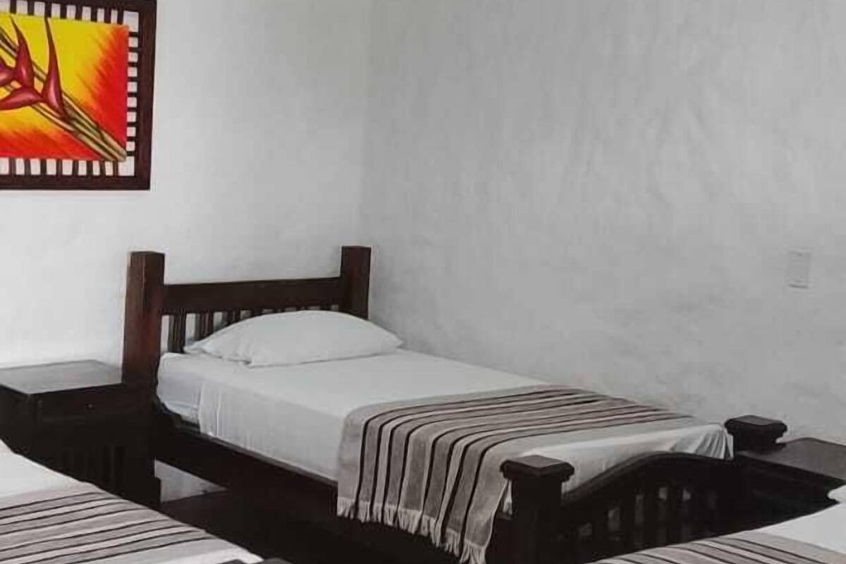 Chambre Triple, patio, vue jardin