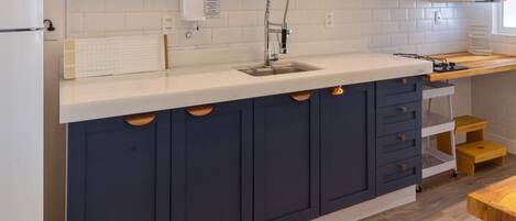 Fridge, microwave, stovetop, coffee/tea maker