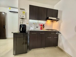 Family Apartment, City View | Private kitchen | Mini-fridge, microwave, stovetop, dishwasher