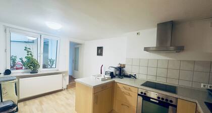 Geräumige 4-Zimmer Wohnung mit Terrasse und Garten
