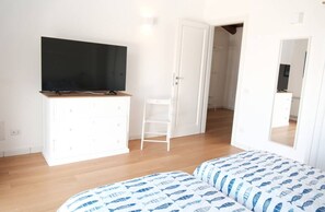 2 habitaciones, tabla de planchar con plancha, wifi y ropa de cama 