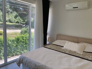 2 عدّة غرف نوم ومكواة/لوح كي وواي فاي