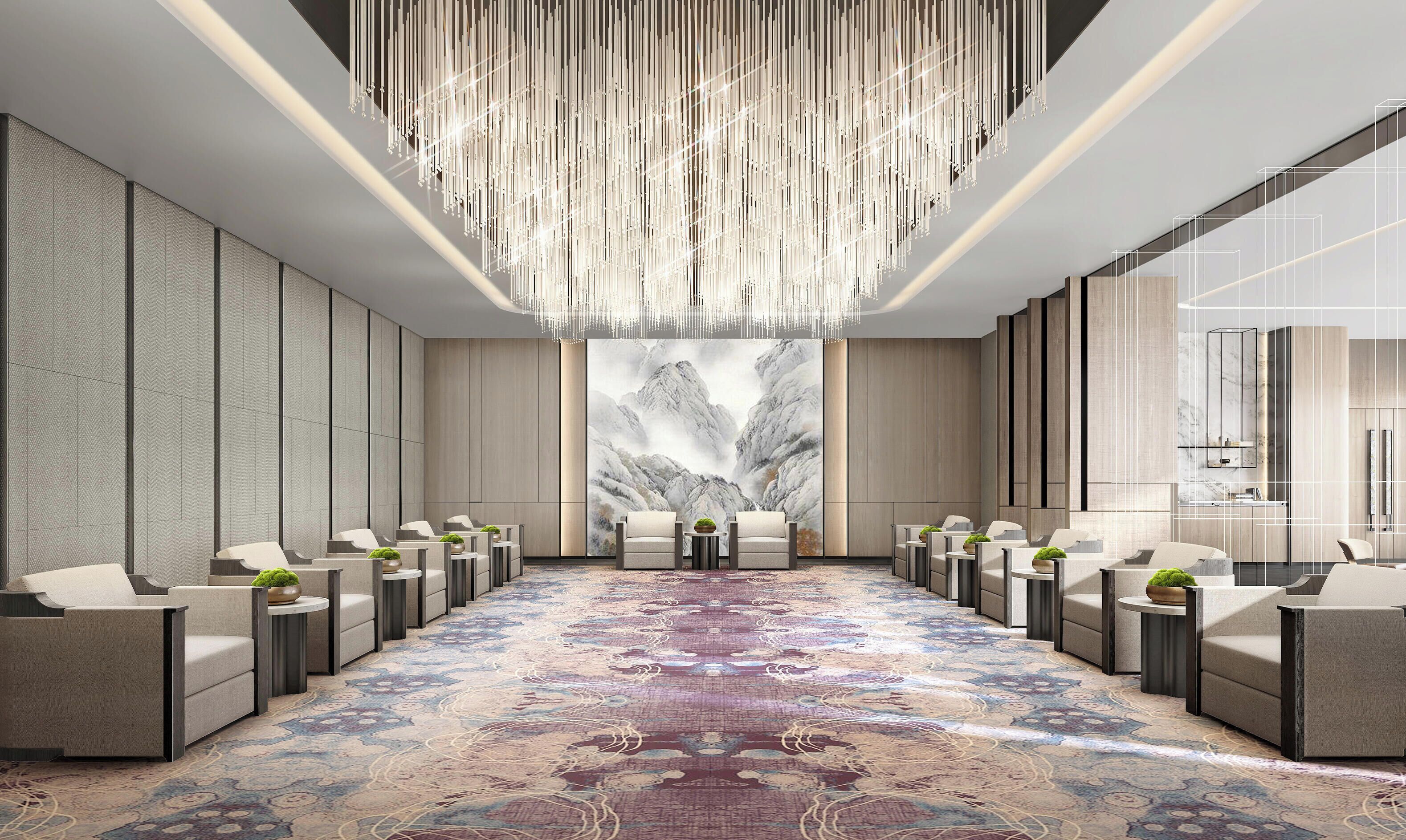 Un moderno vestíbulo de hotel con un mostrador de recepción alargado, asientos cómodos y una gran decoración mural.