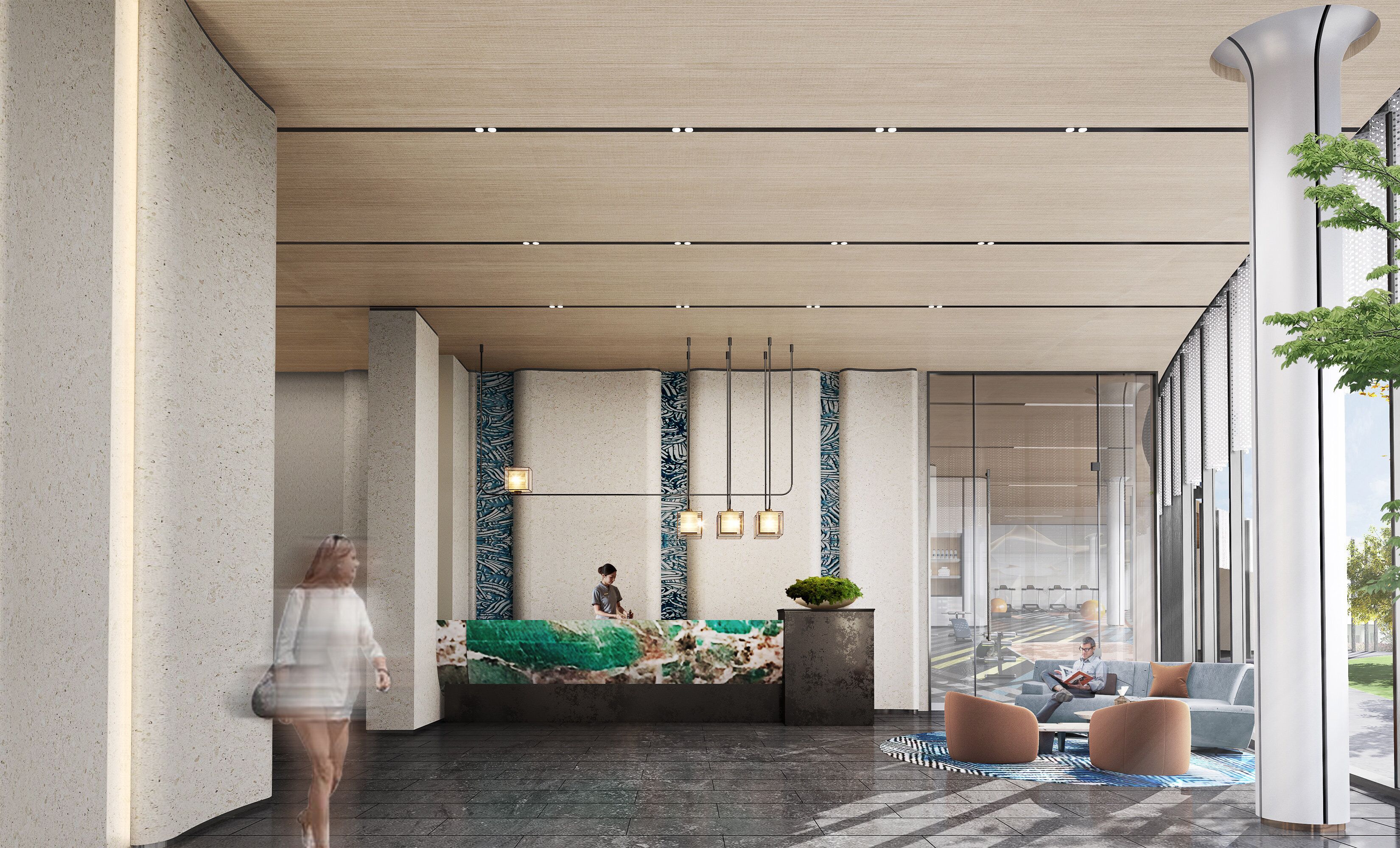 A modern lobby with a reception desk, seating area, and large windows.
