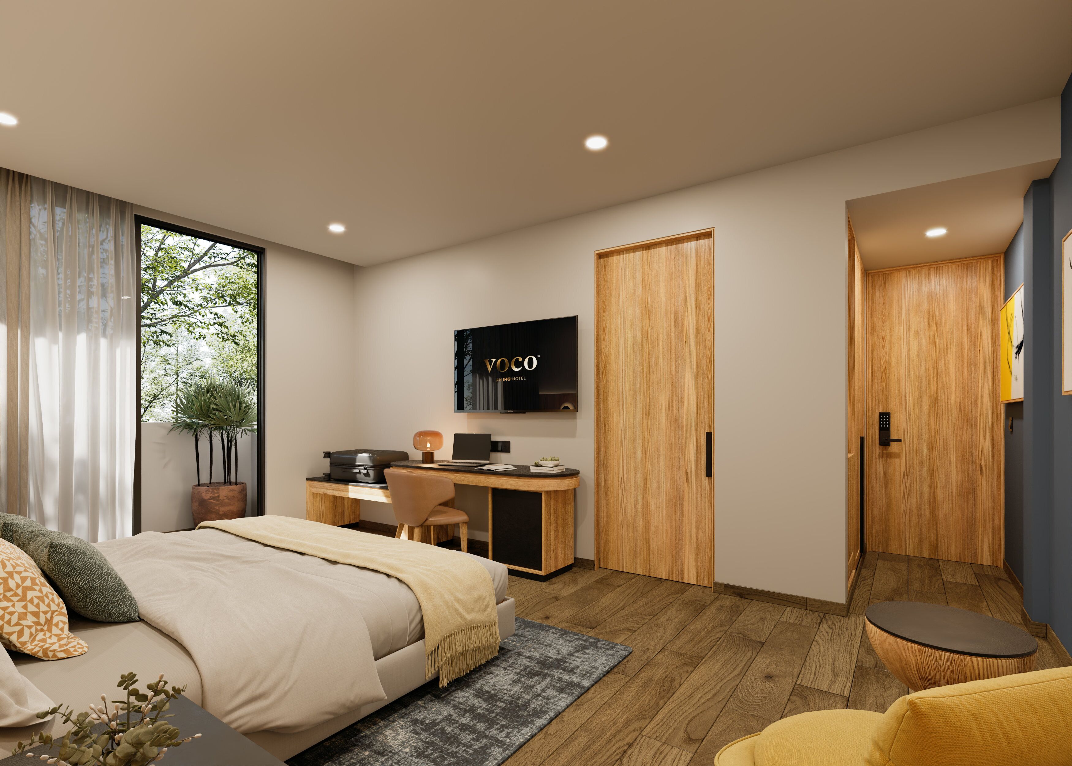 A modern hotel room with a bed, desk, and TV.