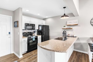 Condo, Multiple Beds, Balcony (Sunsational Views at Anchors Point) | Private kitchen | Fridge, microwave, oven, stovetop