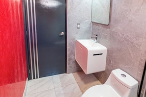 Shower, towels, soap, toilet paper