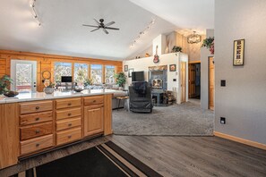 TV, fireplace, books, offices