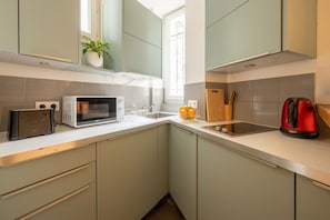 Fridge, microwave, coffee/tea maker, toaster