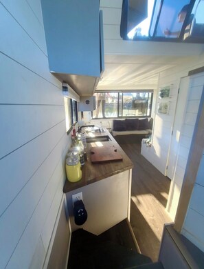 Fridge, microwave, stovetop, coffee/tea maker