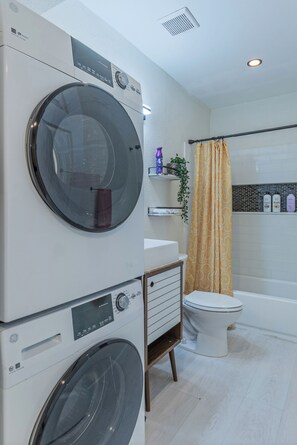 Hair dryer, towels, soap, shampoo