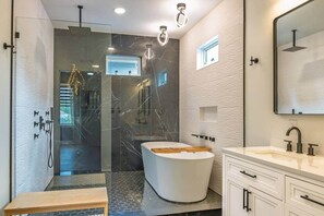 Shower, hair dryer, towels, soap