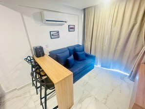 Comfort Apartment | Living area | 32-inch LED TV with digital channels - Essenza Porto de Galinhas - Flat na Praia (Ipojuca)