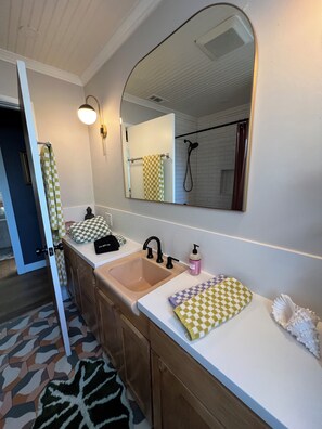 Hair dryer, towels, soap, shampoo