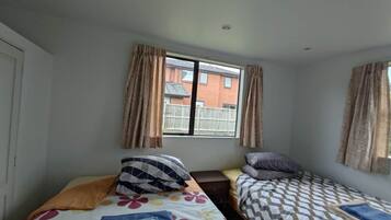 2 habitaciones, tabla de planchar con plancha y wifi gratis