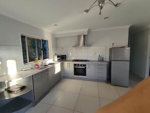 Fridge, microwave, dining tables