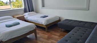 5 Beds including 1 Double Bed, 2 single Beds, 2 Double Sofa Beds, Suite 4