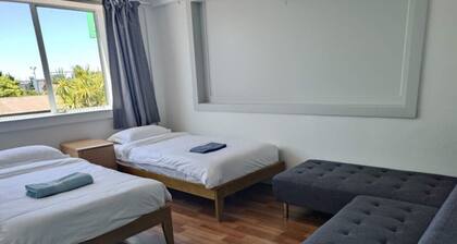 5 Beds including 1 Double Bed, 2 single Beds, 2 Double Sofa Beds, Suite 4