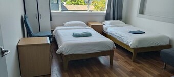 5 Beds including 1 Double Bed, 2 single Beds, 2 Double Sofa Beds, Suite 4