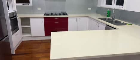 Fridge, microwave, toaster, cookware/dishes/utensils