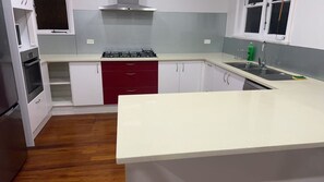 Fridge, microwave, toaster, cookware/dishes/utensils