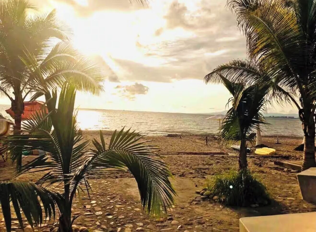 On the beach, sun loungers, beach towels