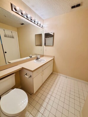 Hair dryer, towels, soap, toilet paper