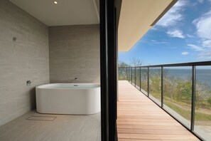 Superior Suite, Terrace, Ocean View | Bathroom | Separate bathtub and shower, free toiletries, hair dryer, slippers